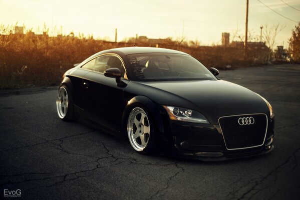 Black Audi tt at sunset