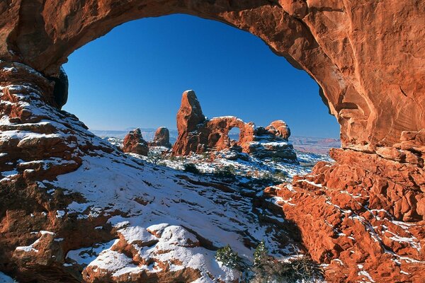 Interesting arches in the mountains in the snow