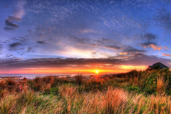 Sonnenuntergang Himmel an der Küste