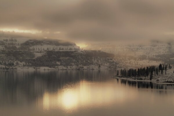 Beautiful landscape of the lake on a foggy morning