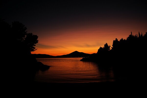 Mountains in the orange light of sunset fire