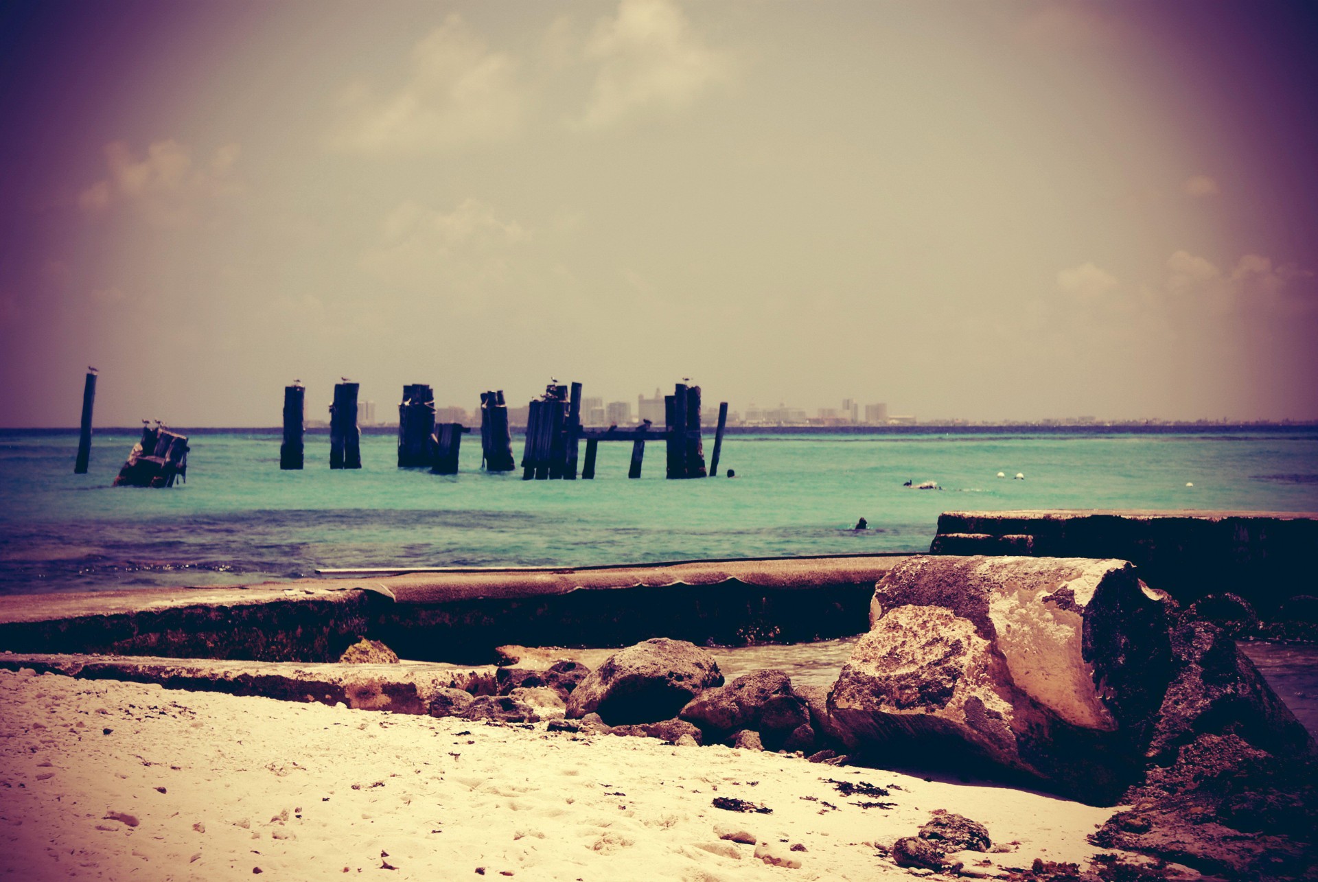 isla mujeres sea destruction pier town