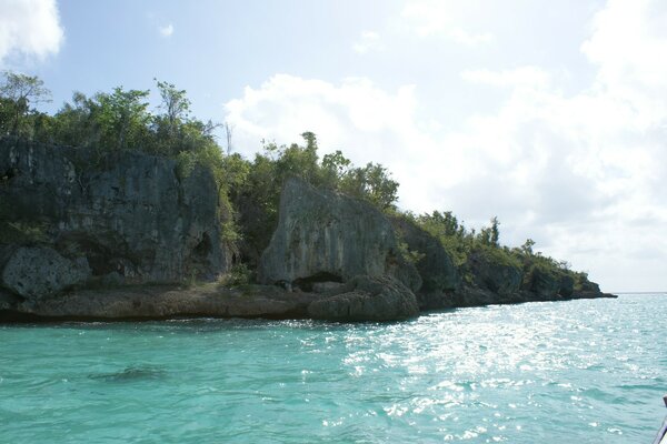 Sheer cliffs on the azure sea