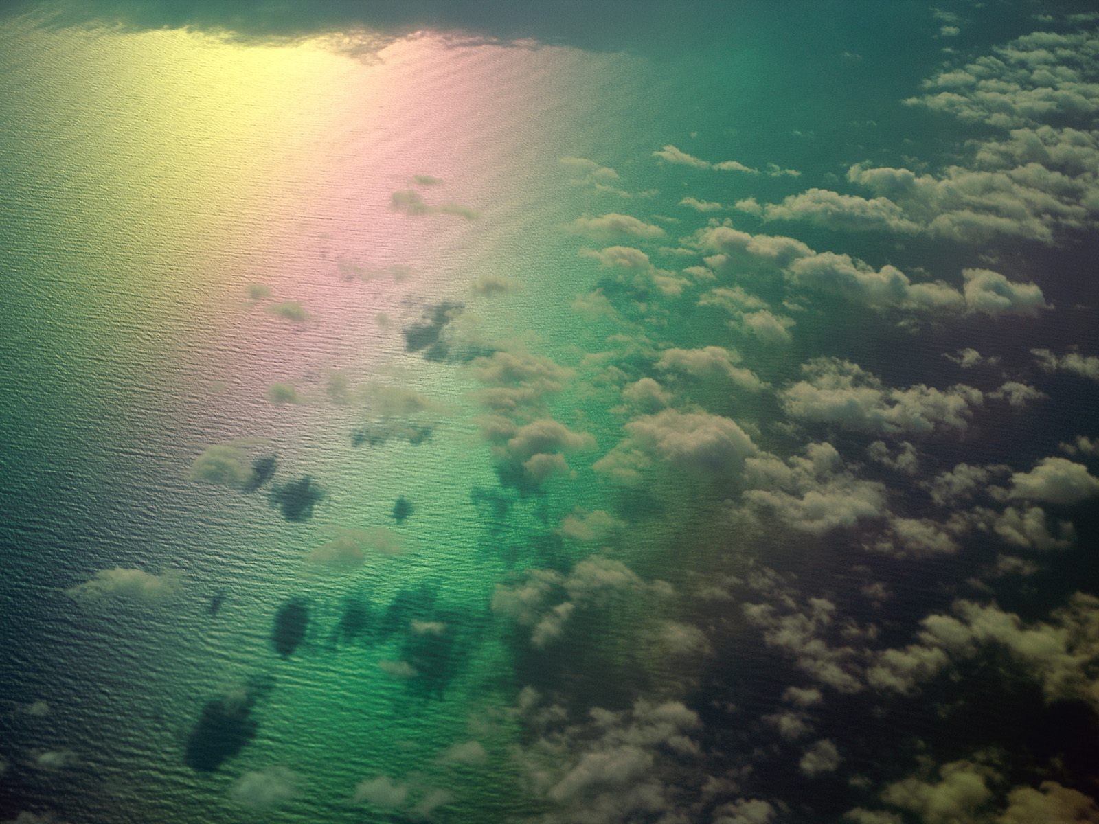 rainbow clouds ocean