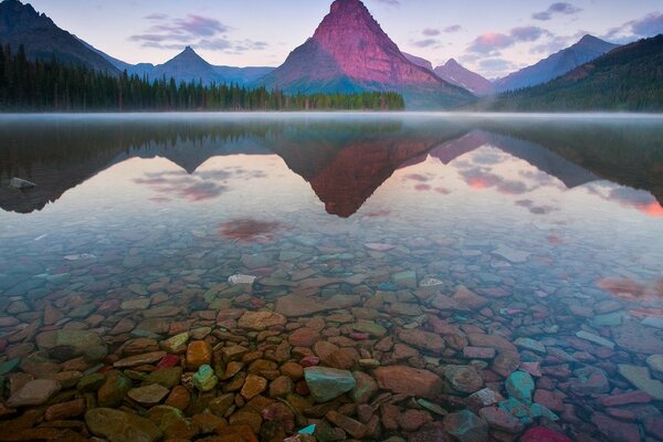 Rocky lake forest and mountains