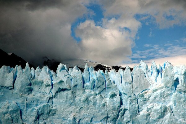 Landscape with mountain glaciers and sky