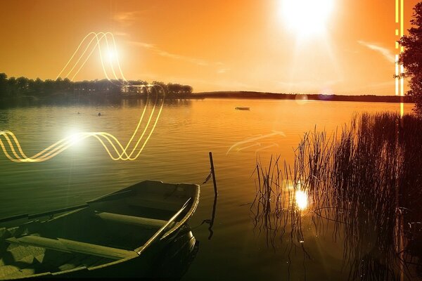 Barco al atardecer en el lago