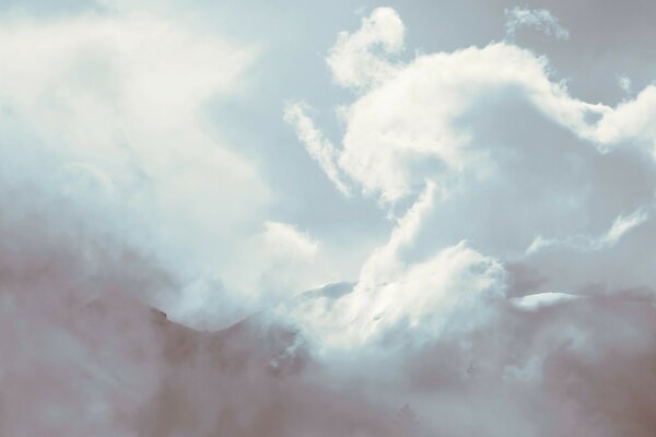 Light clouds in a mountainous area