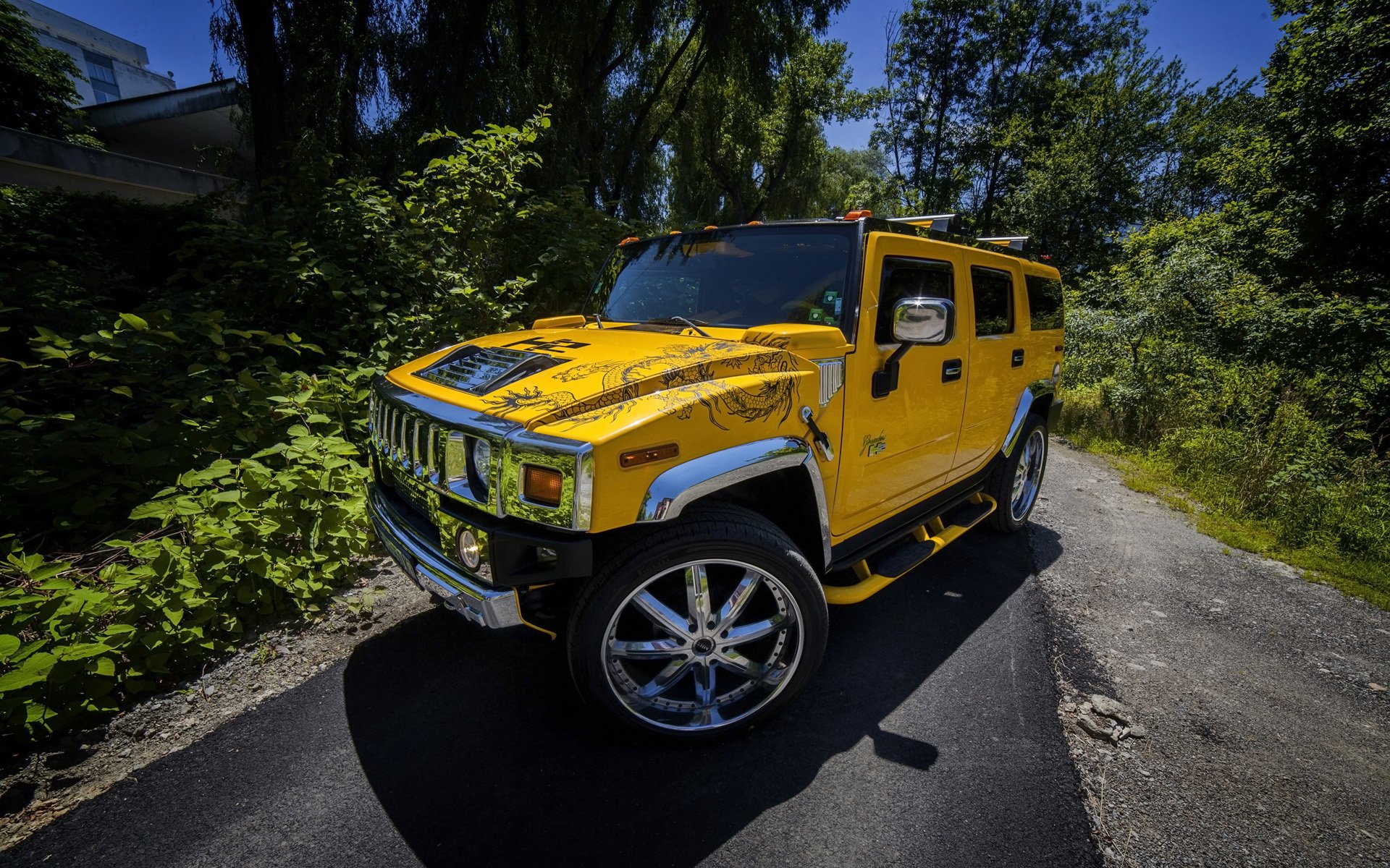 wilner hummer h2 hummer yellow wheels front background