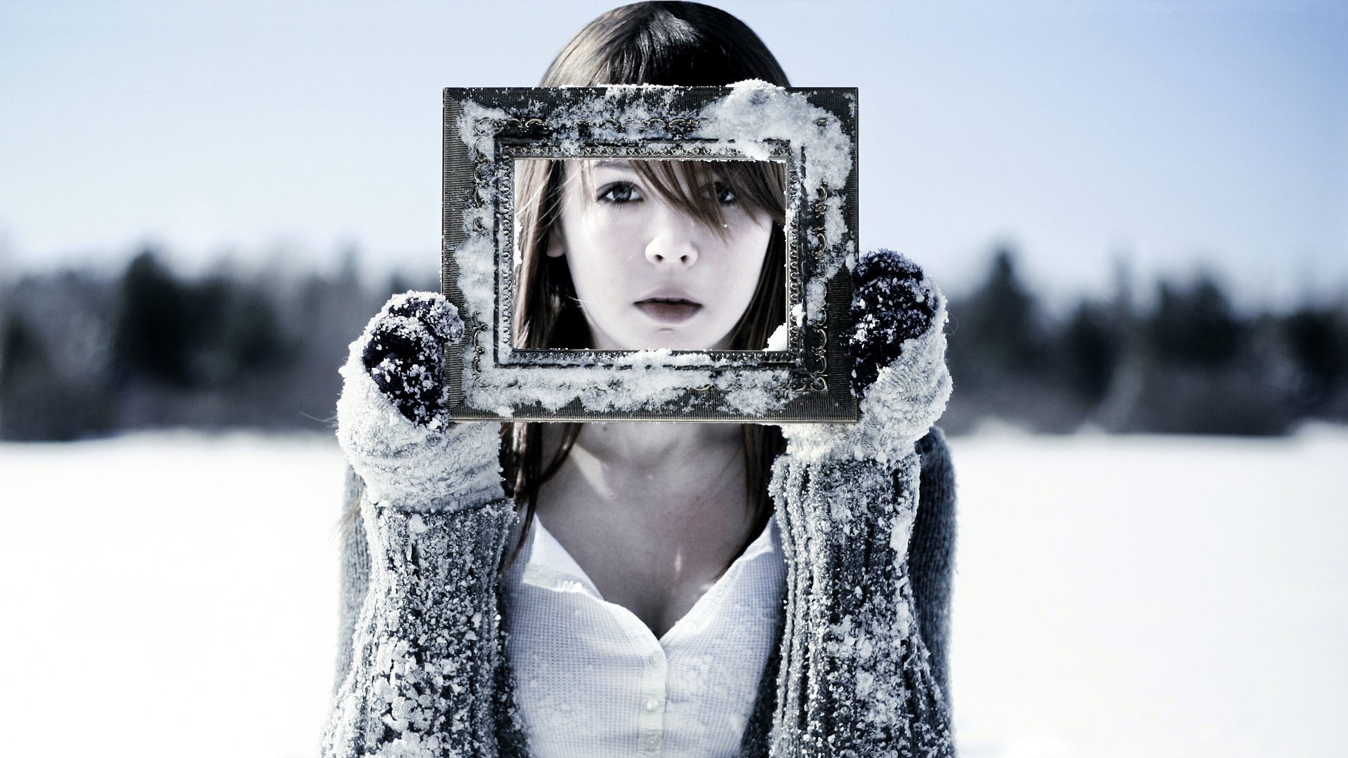 girl snow frame gloves cold winter face frost