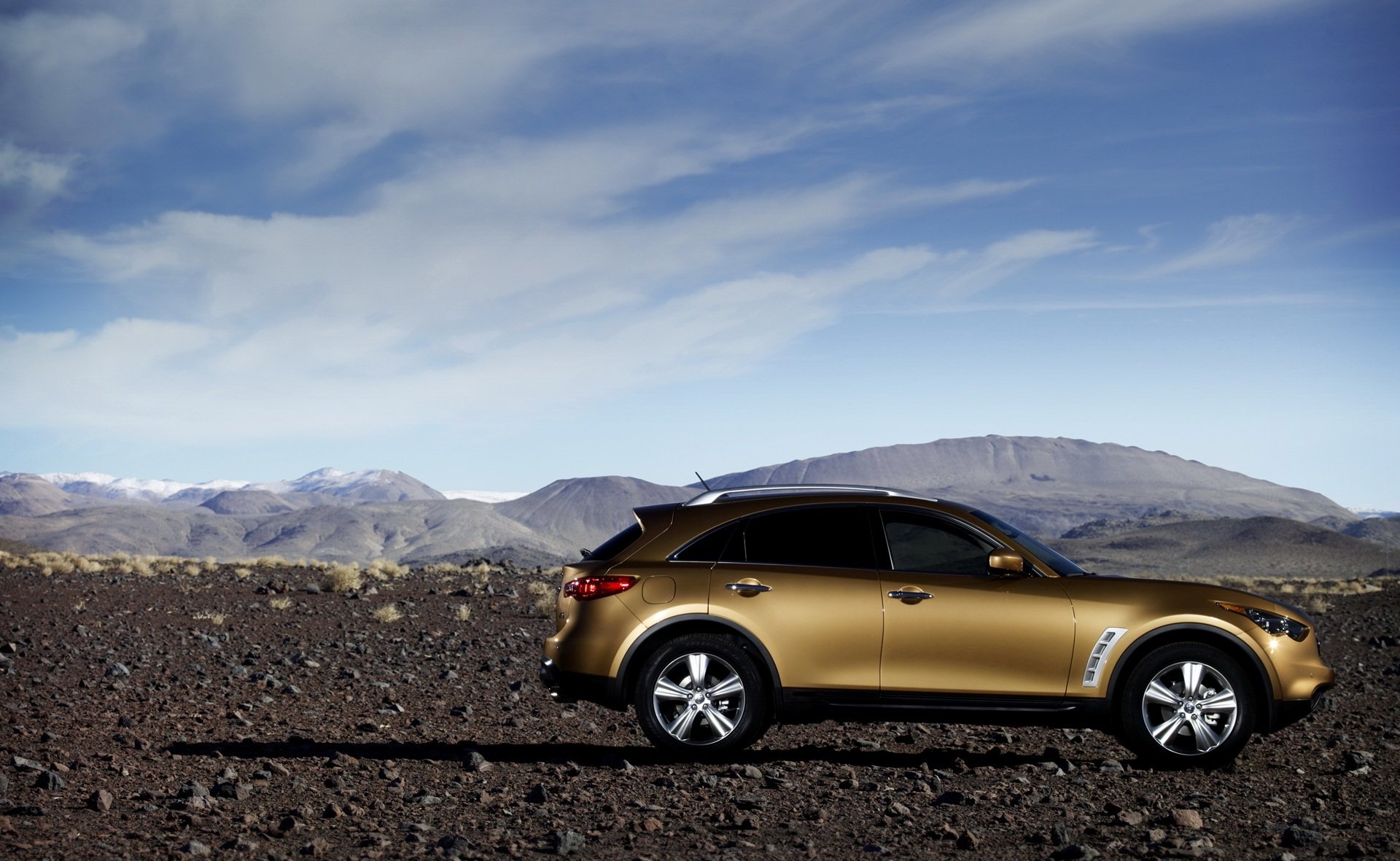 infinity fx35 2009 tinting on the side right tank doors sky clouds shadow desert sand orange oranzhevaya drives stones mountain dunes bush infinity vip