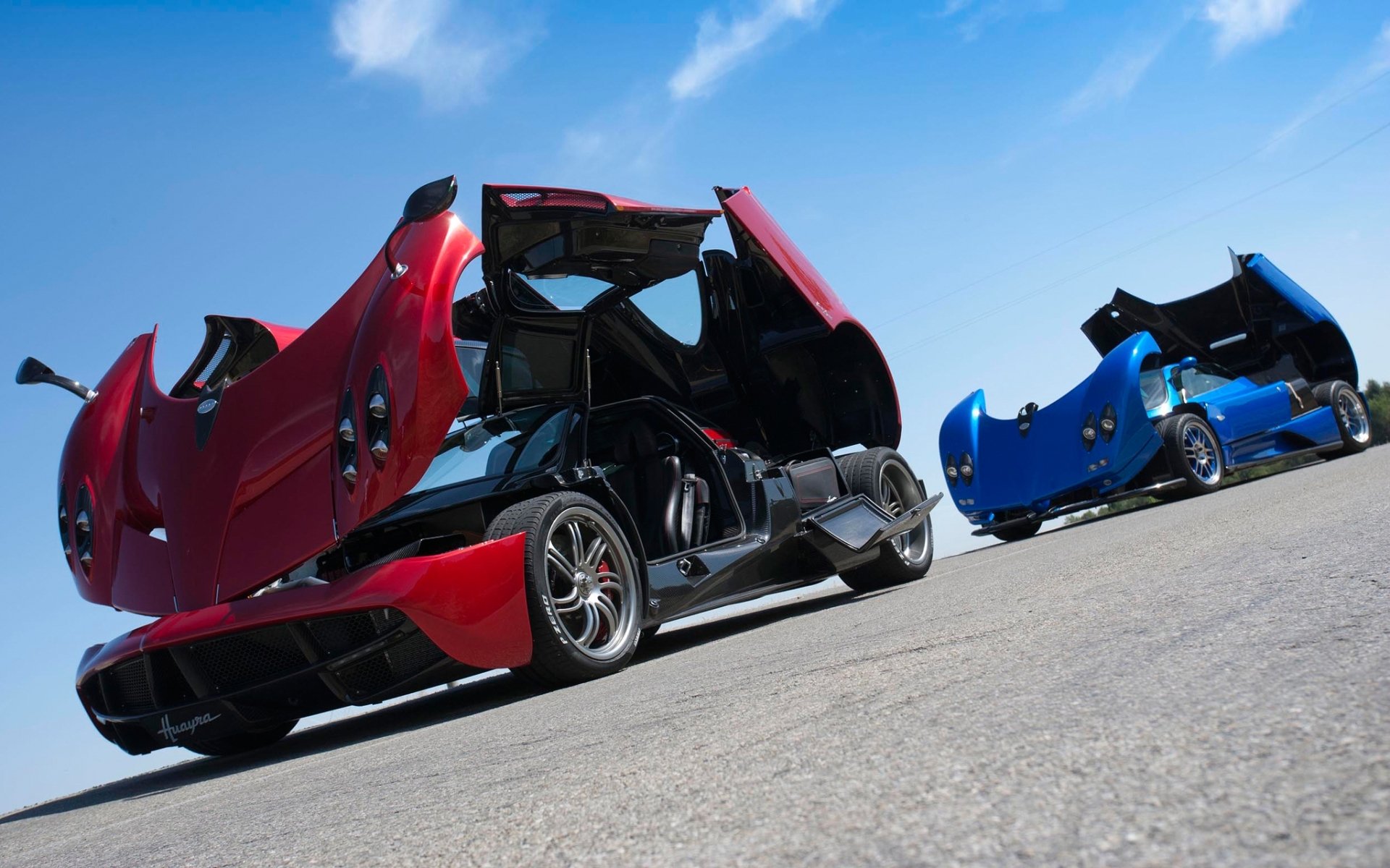 pagani zonda huayra pagani zonda huayra supercars rouge bleu avant ciel