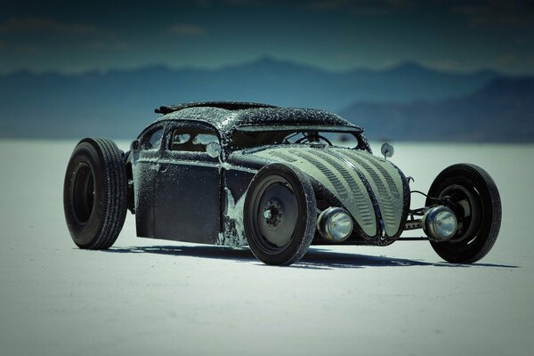 Hot rod on a salt lake under the scorching sun