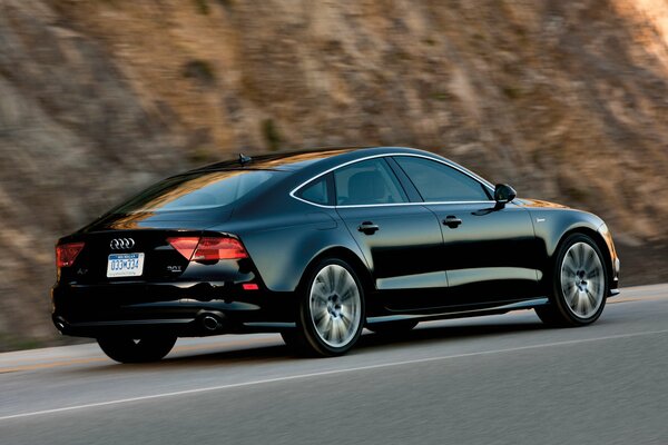 Car. Black Audi A7 on the road