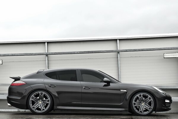 Black Porsche Panamera on gray