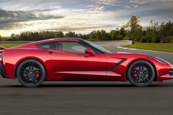 Side view of a red sports Chevrolet