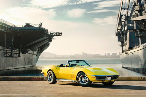 Yellow chevrolet corvette car on the road