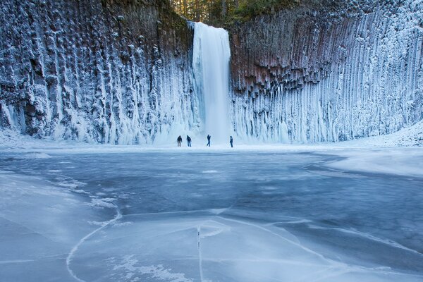 A beautiful waterfall among the ice