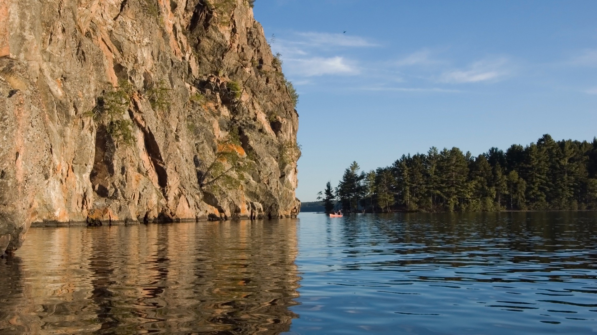 mountain water boat tree