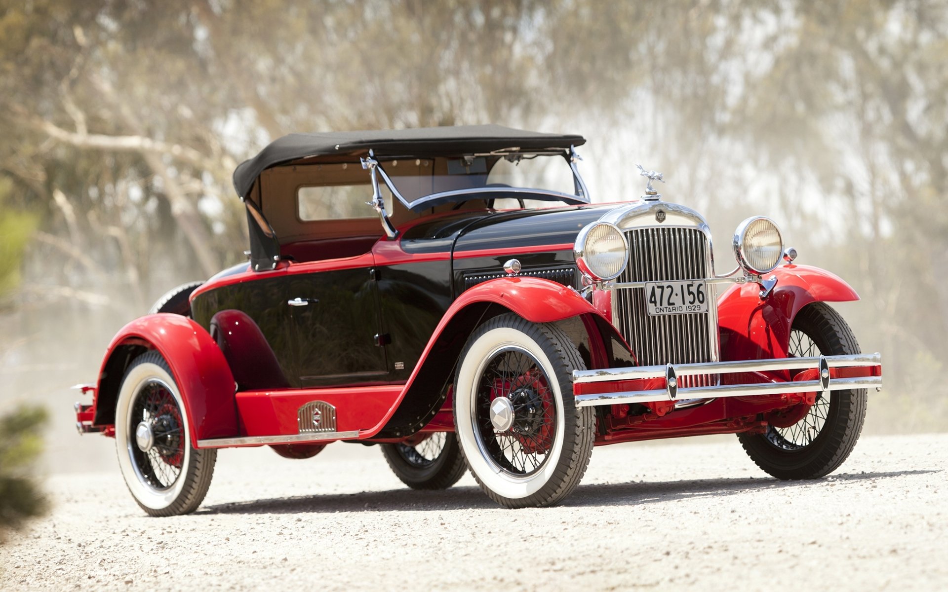 essex speedabout boattail roadster przez biddell & smart 1929 przód czerwony retro road dust tło