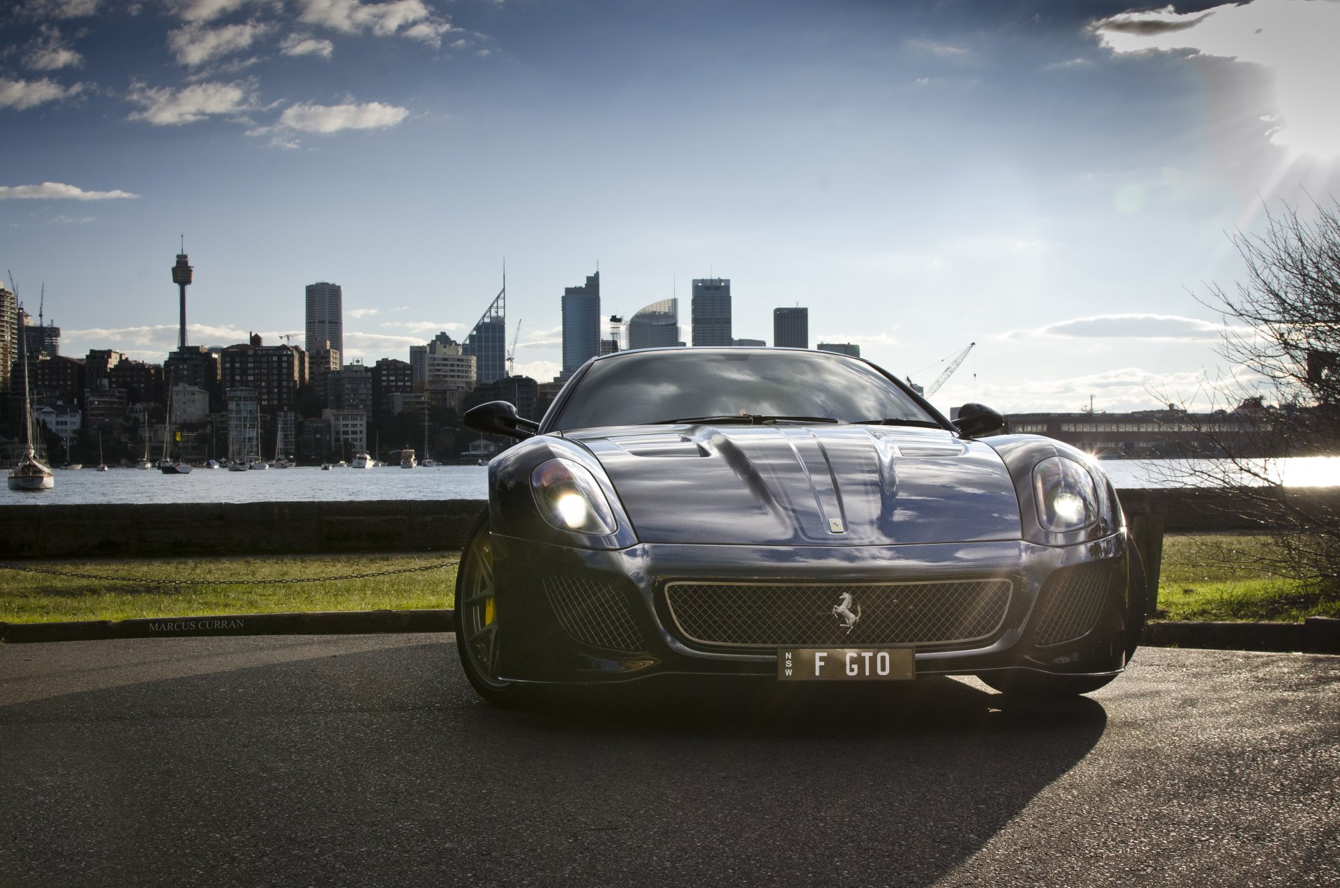 ferrari gto black city ferrari black gto rea sea buildings houses wheels in front of stands marcus curren