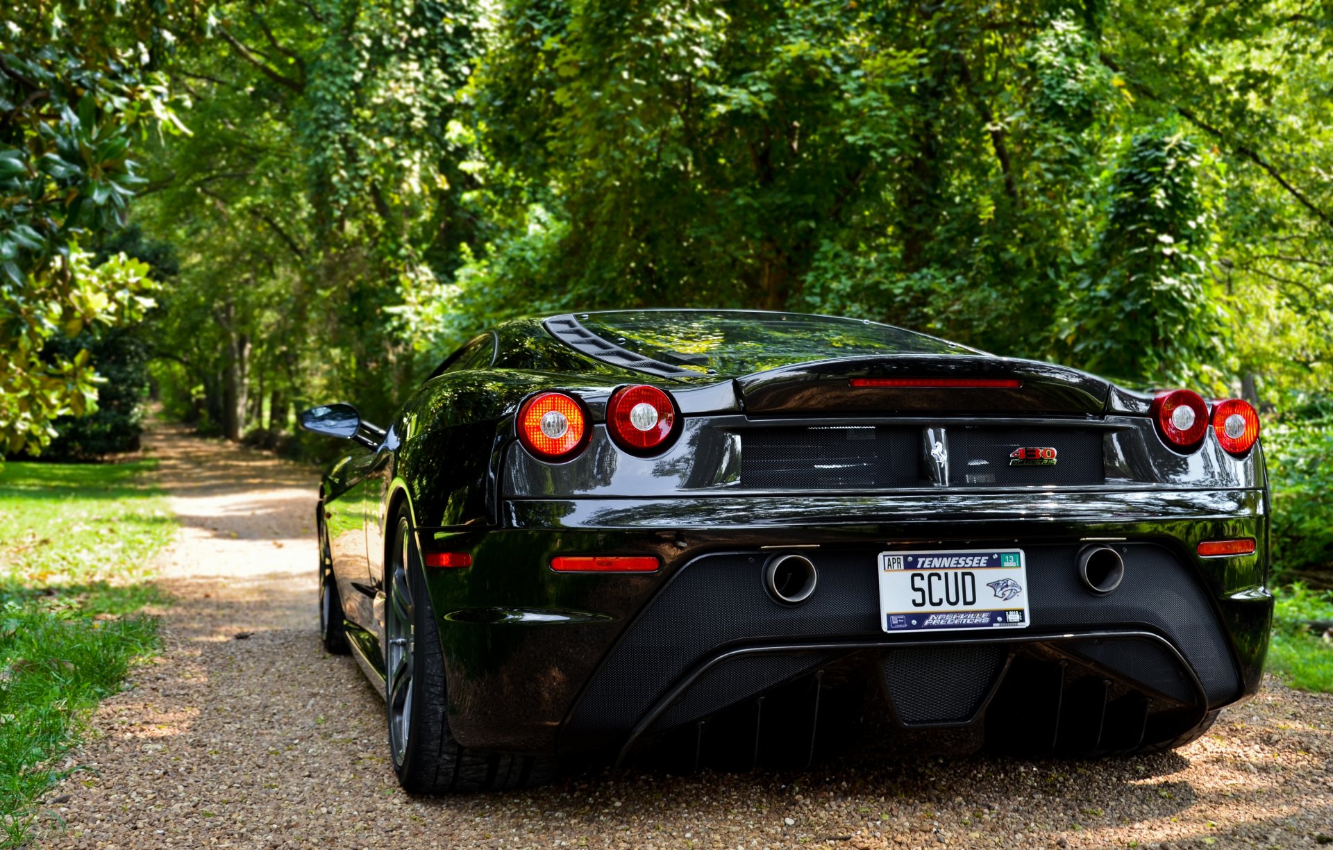 ferrari f430 noir scuderia ferrari f430 scuderia noir arrière ombre arbres