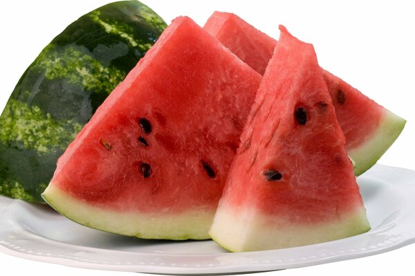 Juicy pieces of watermelon on a white background