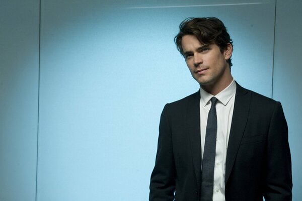 Handsome Matthew Bomer in a classic business suit