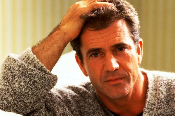 Image of actor Mel Gibson in a sweater