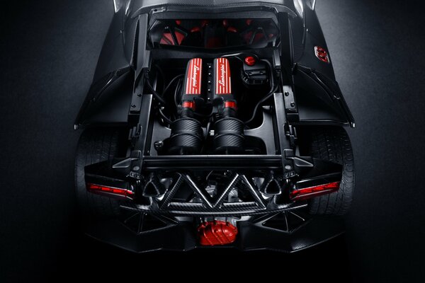 Black lamborghini sesto. engine compartment, engine. rear view