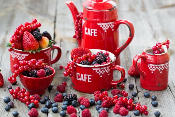 Berries in a red coffee set