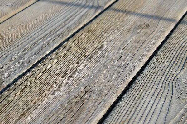 Wooden flooring made of planed, but not painted boards