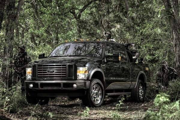 Ford shrouded in fluffy greenery
