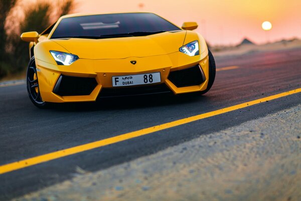 Lamborghini yellow cigarette on the road in Dubai