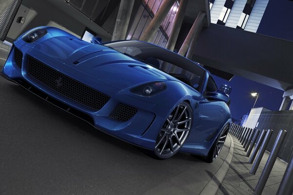 Blue Ferrari supercar on asphalt