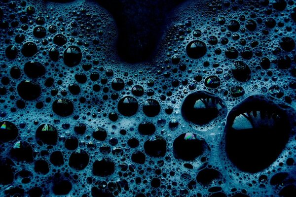 Beautiful soap foam on a black background