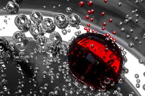 Liquid bubbles in red silver color