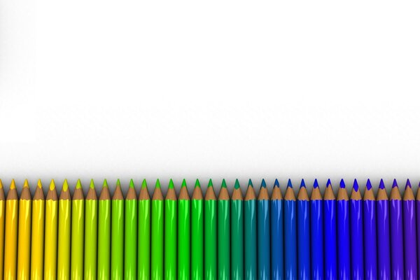 Multicolored pencils against black and white