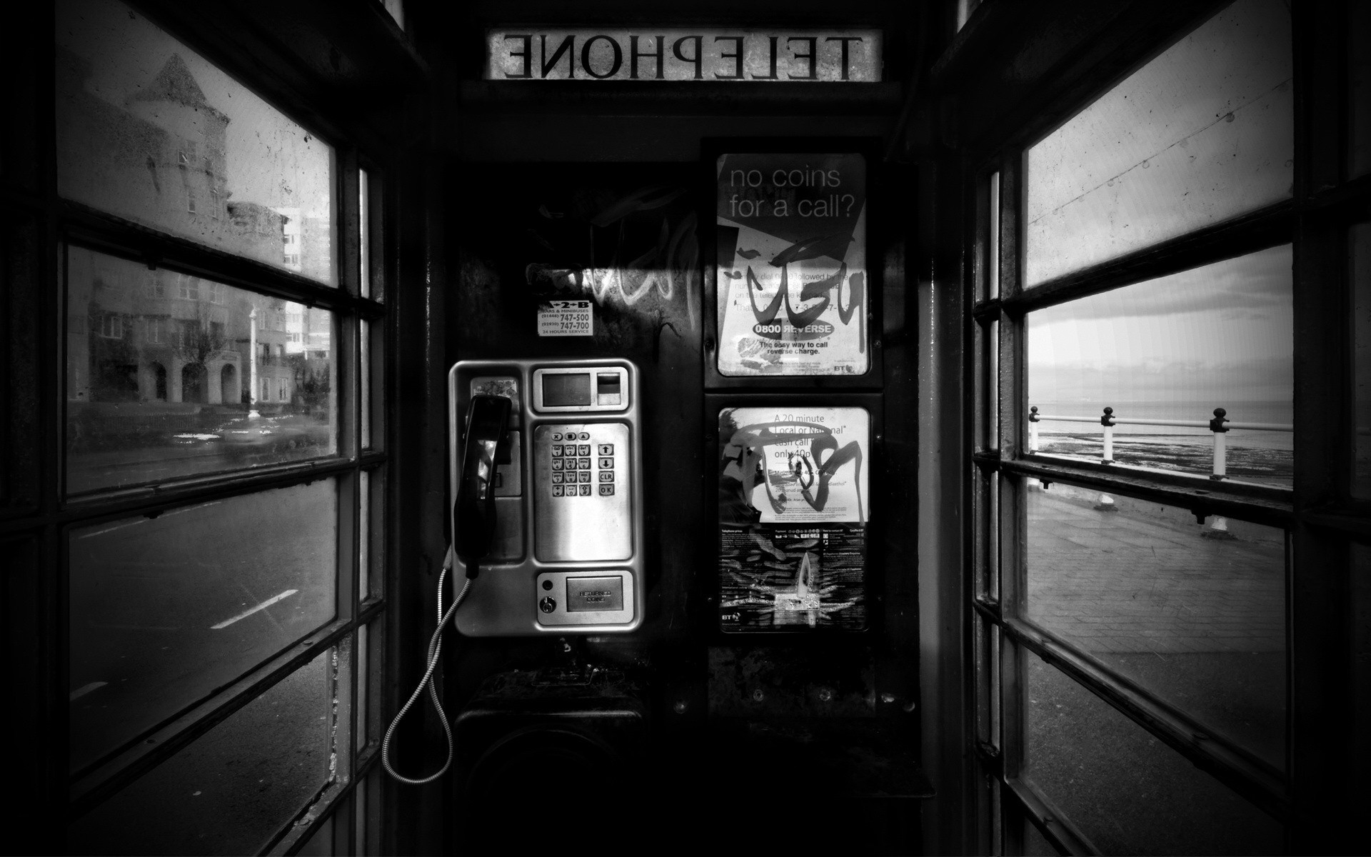 black and white phone booth