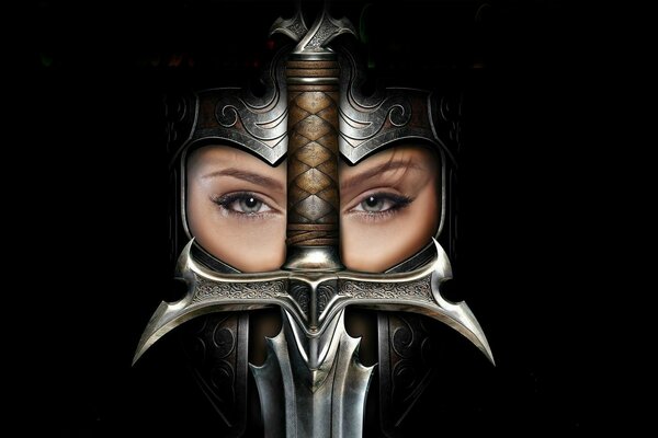 The face of a girl in a helmet who looks through a sword