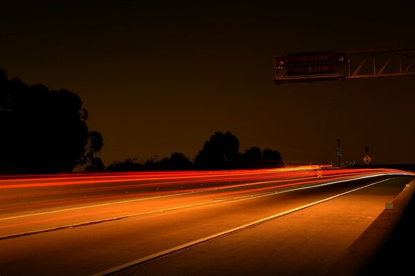 Empty night highway in lights