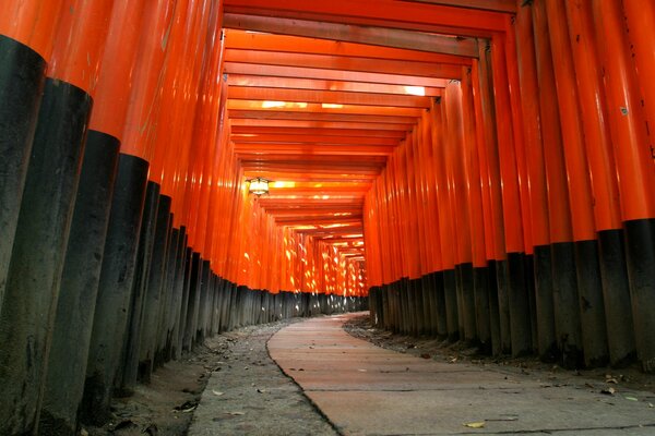 A temple in Japan made of red and black painted wood