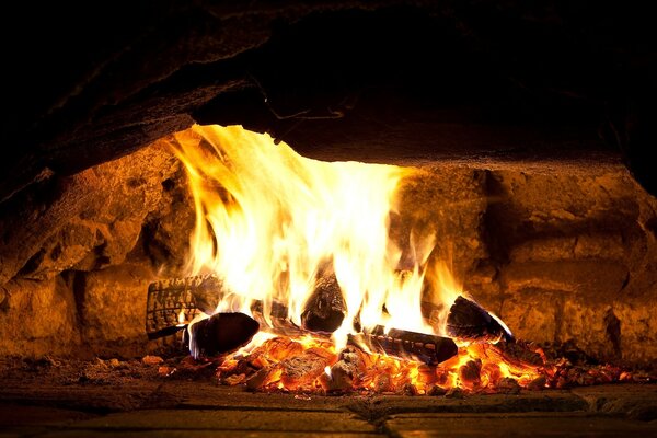 Atmospheric photo of a burning fire in the fireplace