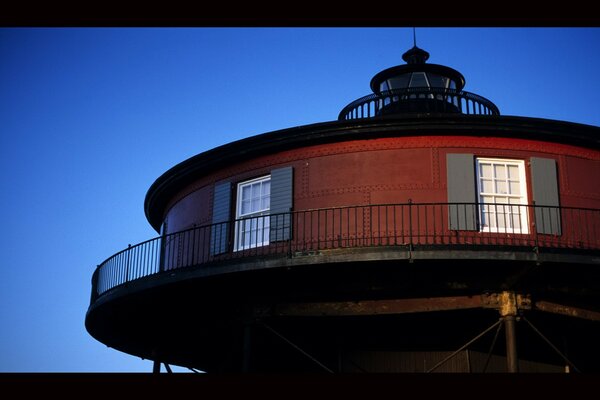 Windows of the red round lighthouse