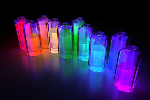 Multicolored liquids in glass jars