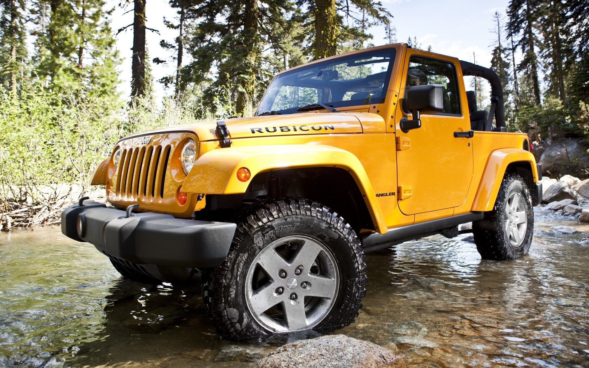 jeep wrangler rengler rubicon suv avant forêt arbres pierres gué eau