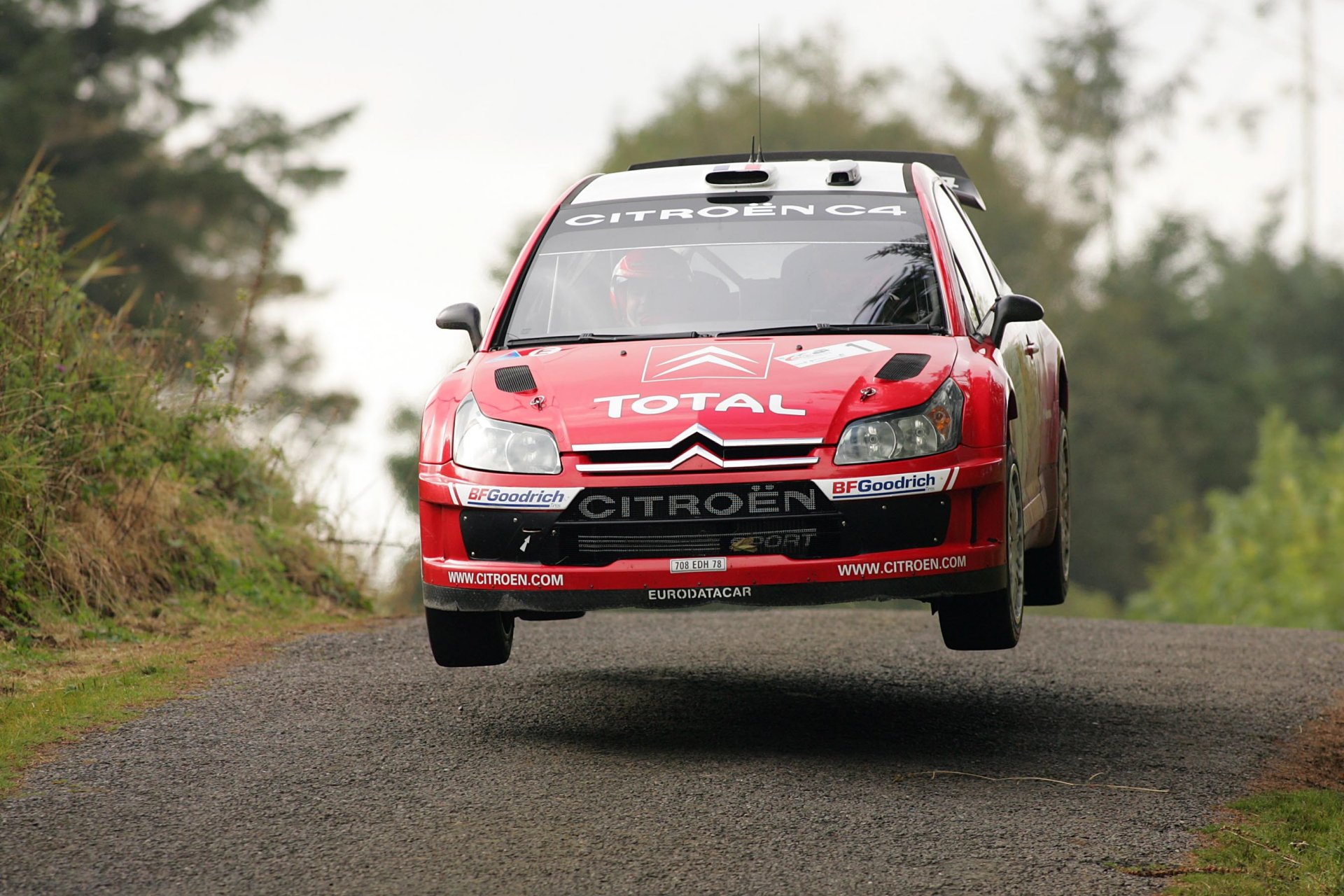 citroen c4 wrc rally rally red front logo hood wheels in the air