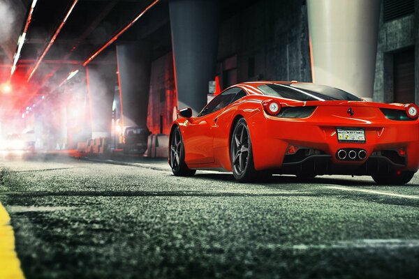 Red Ferrari on the evening road