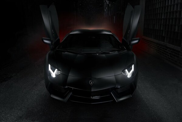 Black Lamborghini Aventador , doors to the top, beautiful front headlights, Lamborghini logo