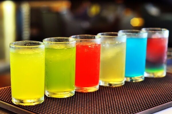 Rainbow alcoholic shots on the table